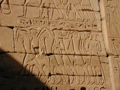 Philistines with feathers on their heads.
                  Illustration in the temple in Medinet Habu, built
                  under Ramesses III