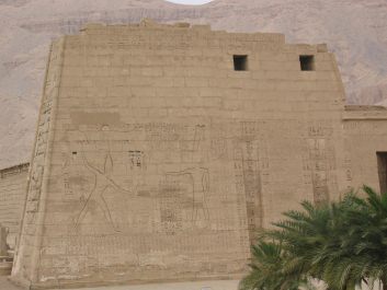 Inscription in the temple wall of the
                        temple of Ramses III in Medinet Habu, left side
                        of the wall