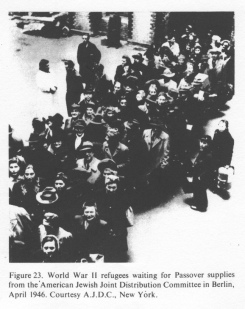 Encyclopaedia Judaica (1971): Germany, vol. 7,
                    col. 498: World War II refugees waiting for Passover
                    supplies from the American Jewish Joint Distribution
                    Committee in Berlin, Apriil 1946. Courtesy A.J.D.C.,
                    New York