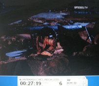 Kohnstein 17: Tunnel mit Tr�mmerteilen
                          vom Raketenbau 02, ein Rad an einer Achse 01