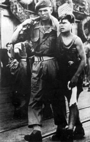 Exodus passengers 02, English soldier
                          with a passenger