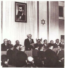 Ben Gurion, declarance of independence with a
                    Herzl foto of racist Herzl. The foto is the program,
                    and the Arabs will never accept this Herzl state...