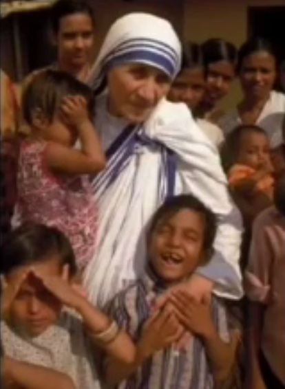 Criminal child trafficker Mother Teresa
                  with children